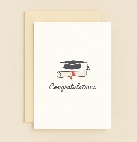 graduation cap and diploma card