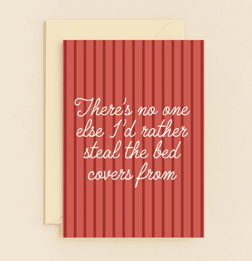 Celebrate your cozy love this Valentine's Day with a card that humorously captures the warmth of sharing bed covers and hearts.