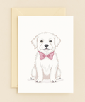 adorable puppy with pink bow card