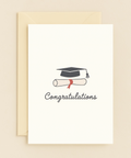 graduation cap and diploma card