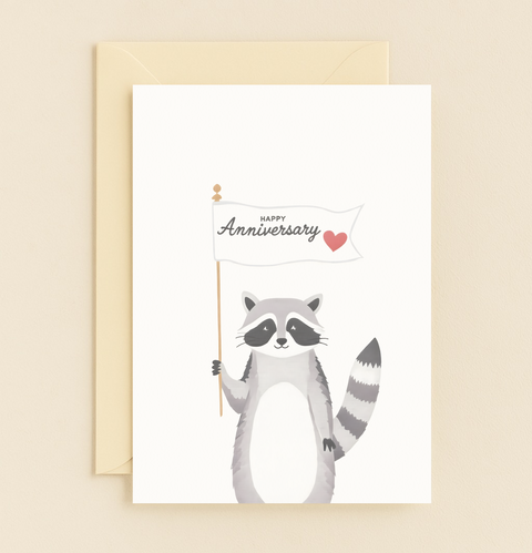 raccoon holding anniversary heart card