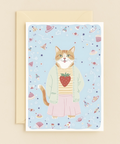 strawberry sweater cat in space card